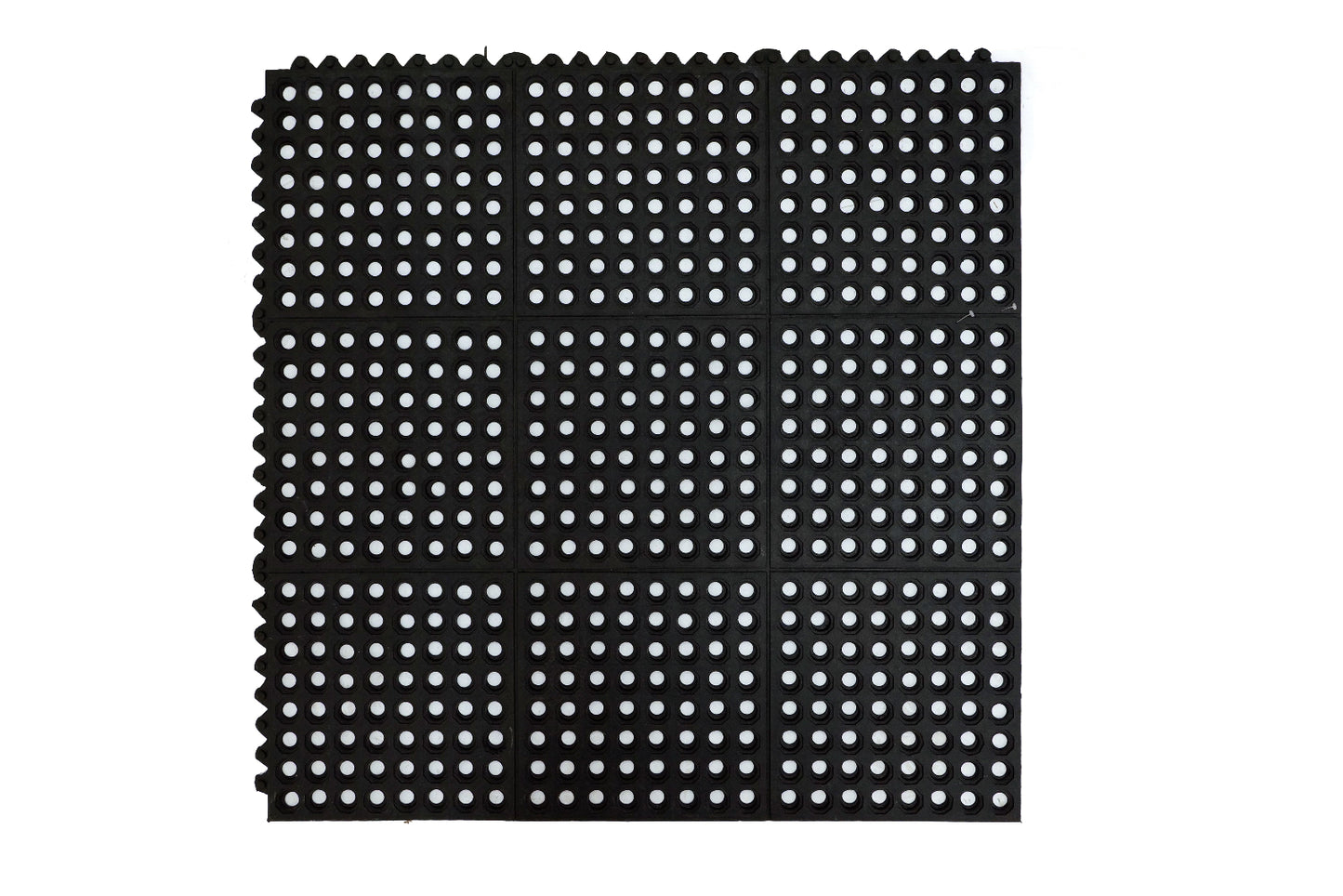 Interlocking black rubber mat with a hollow circular pattern designed for anti-fatigue flooring.