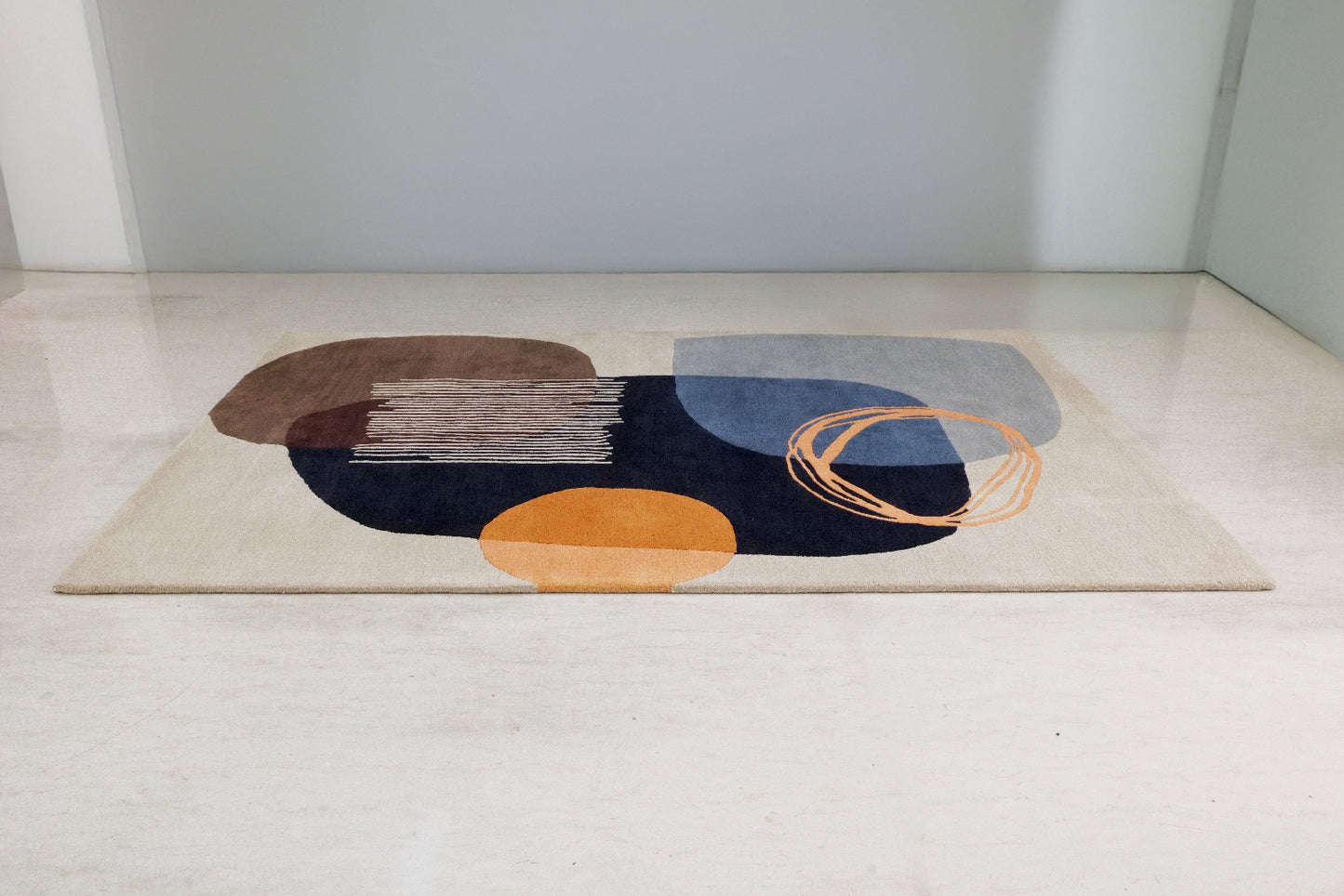Abstract patterned rug on a light-colored floor