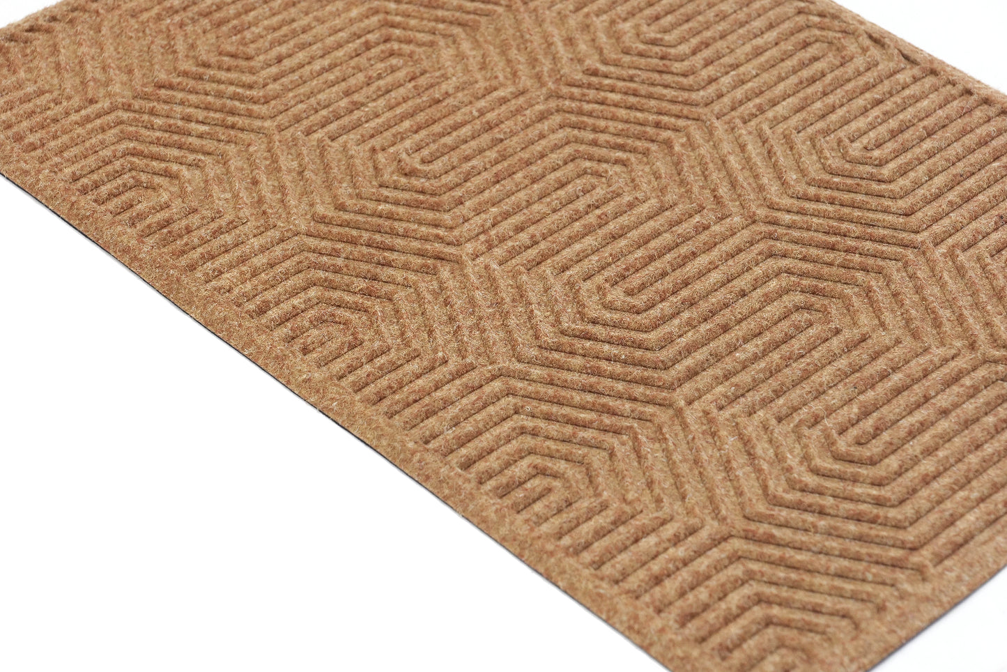 A beige recyled pet door mat with a geometric pattern.