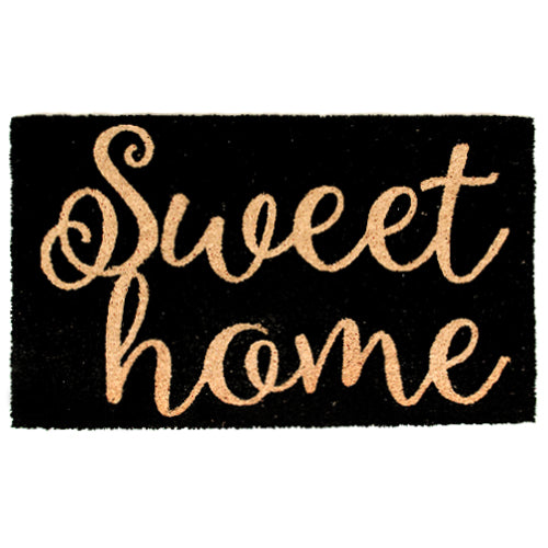 A rectangular black door mat with the phrase 'Sweet Home' printed.