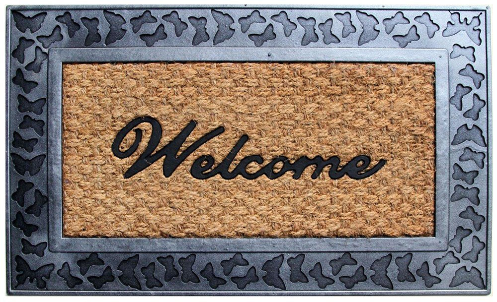 A rectangular doormat with a coir texture in beige colour, featuring a black butterfly border and the word 'Welcome' in bold black letters.