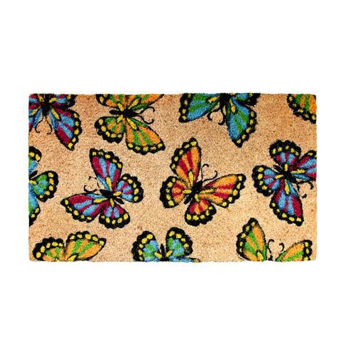 A rectangular coir doormat with a colorful butterfly pattern and a PVC backing.