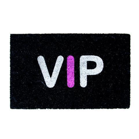 A rectangular black doormat with the word 'VIP' printed in white and an 'I' in pink glitter on the top letter.