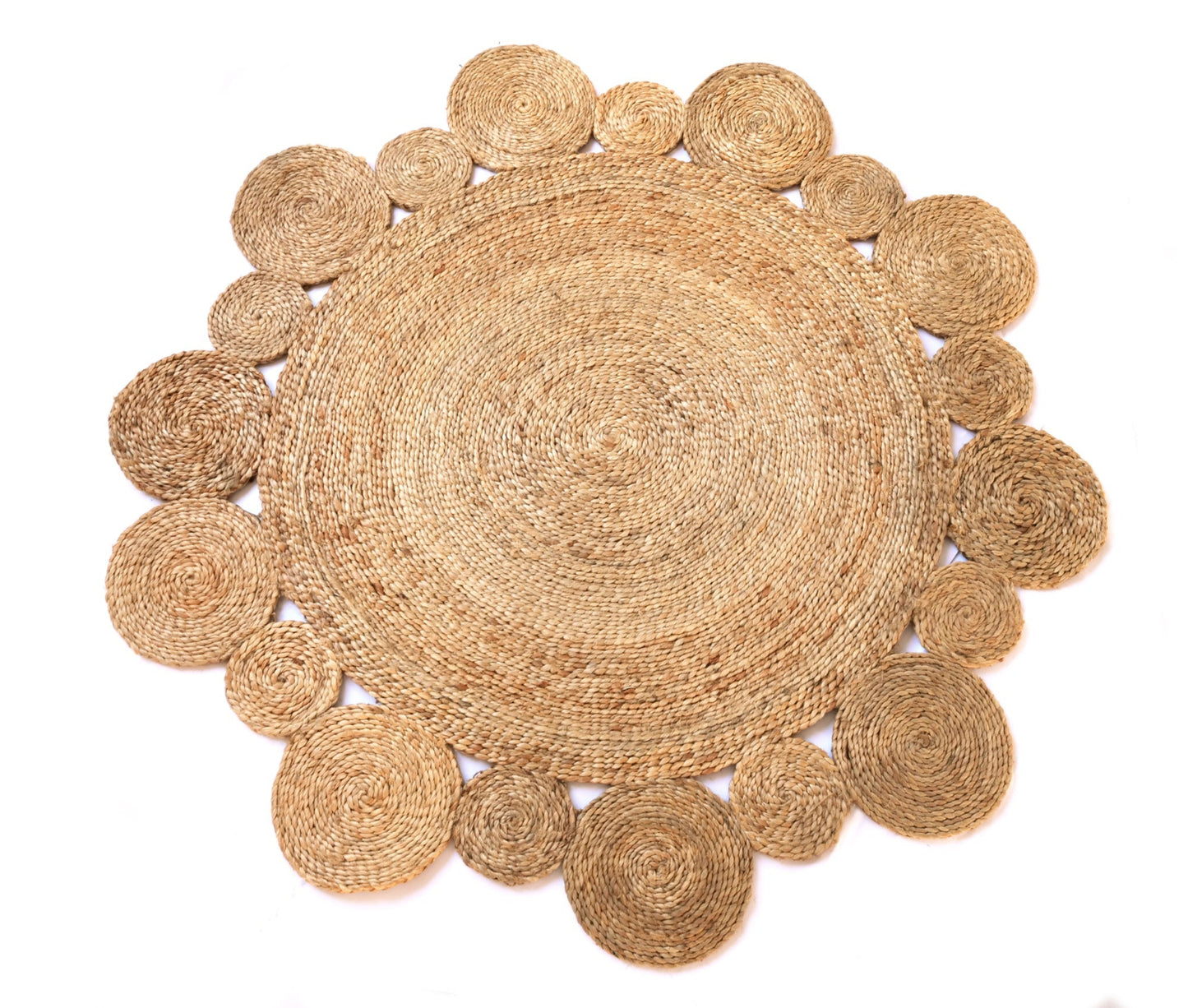 Round woven jute mat with circular patterns on a white background