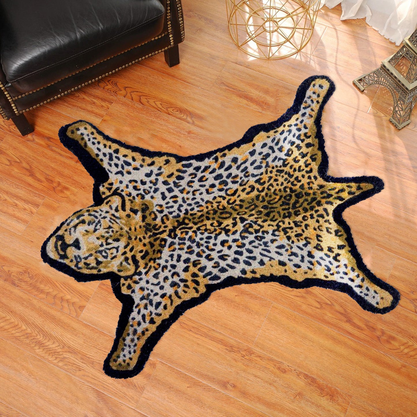 A leopard-shaped coir mat with a animal design, placed on a wooden floor.
