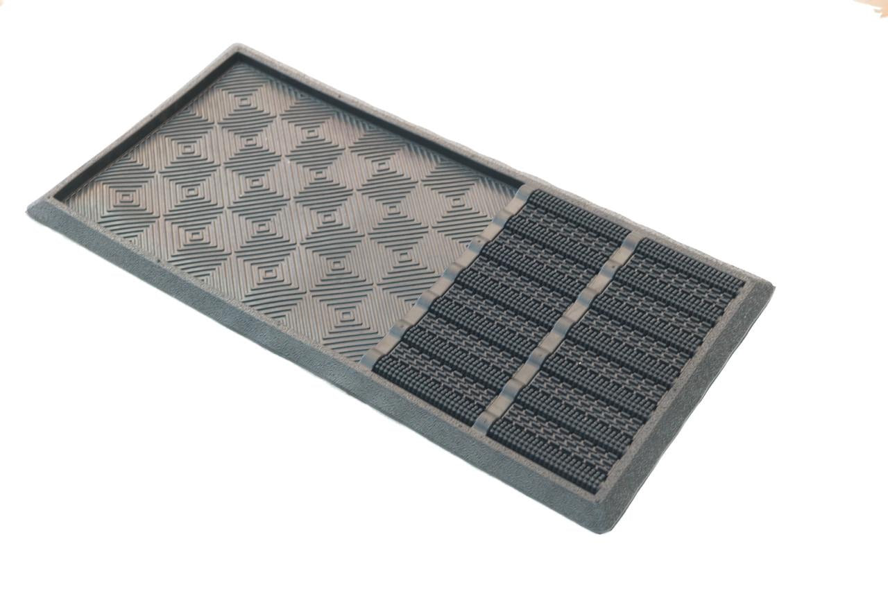 A black and gray checkered rubber door mat designed for sanitizing footwear, with a rubber tray mat and dirt remove ribbed pins.
