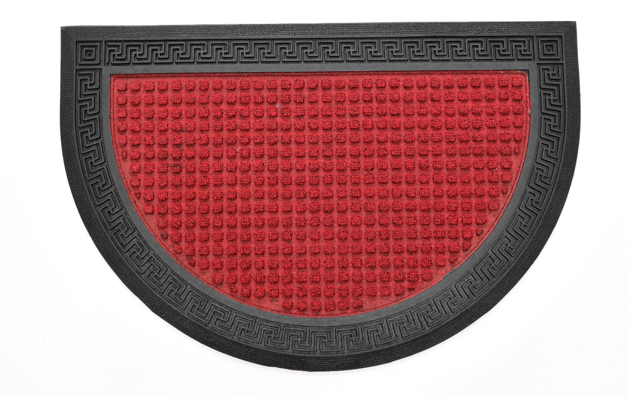 A red and black geometric patterned OnlyMat doormat with a halfmoon shape and anti-slip design.