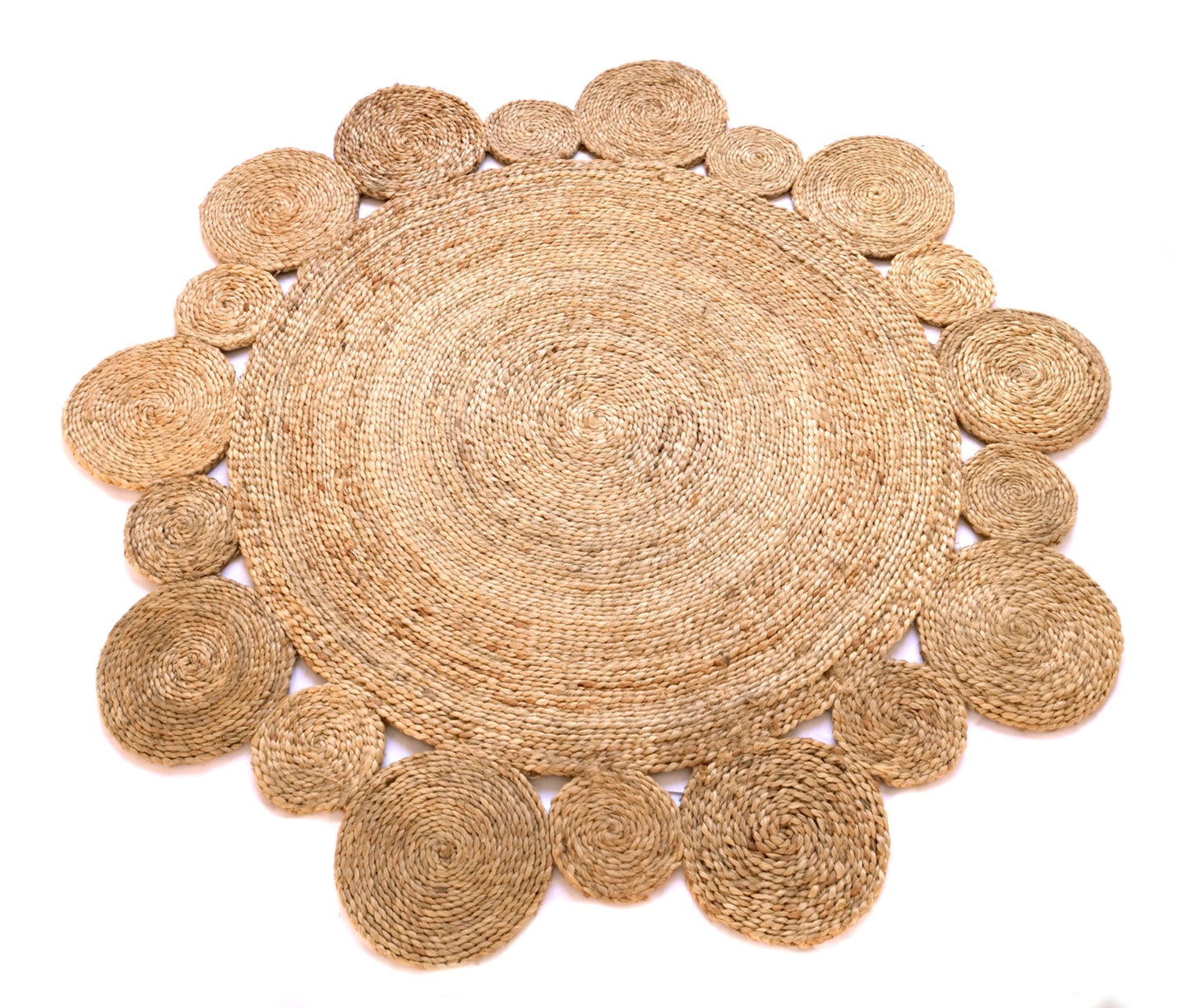 Round woven jute mat with concentric circle design on a white background
