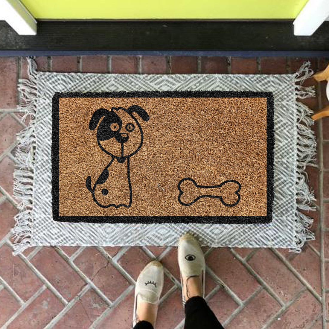 Rectangular coir floor mat with black   Welcome printed design on a coir surface, with an anti-slip backing