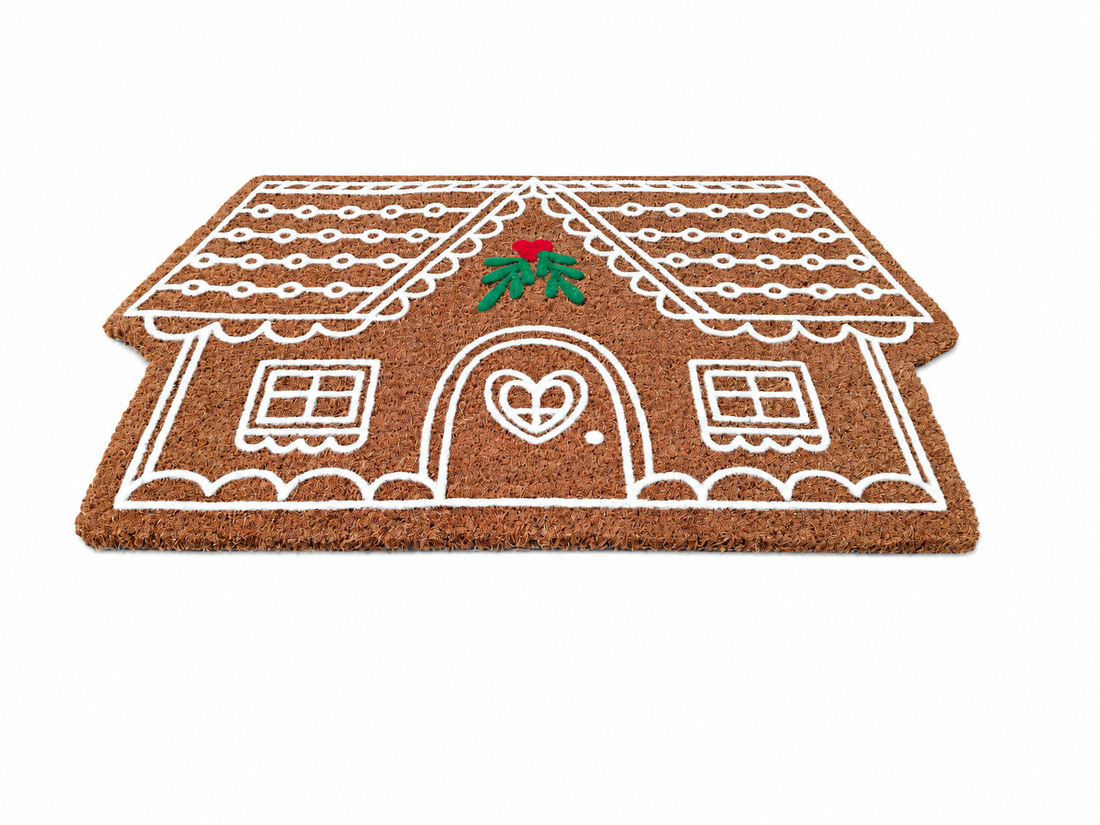 
                      
                        Gingerbread house doormat with a heart door on a white background
                      
                    