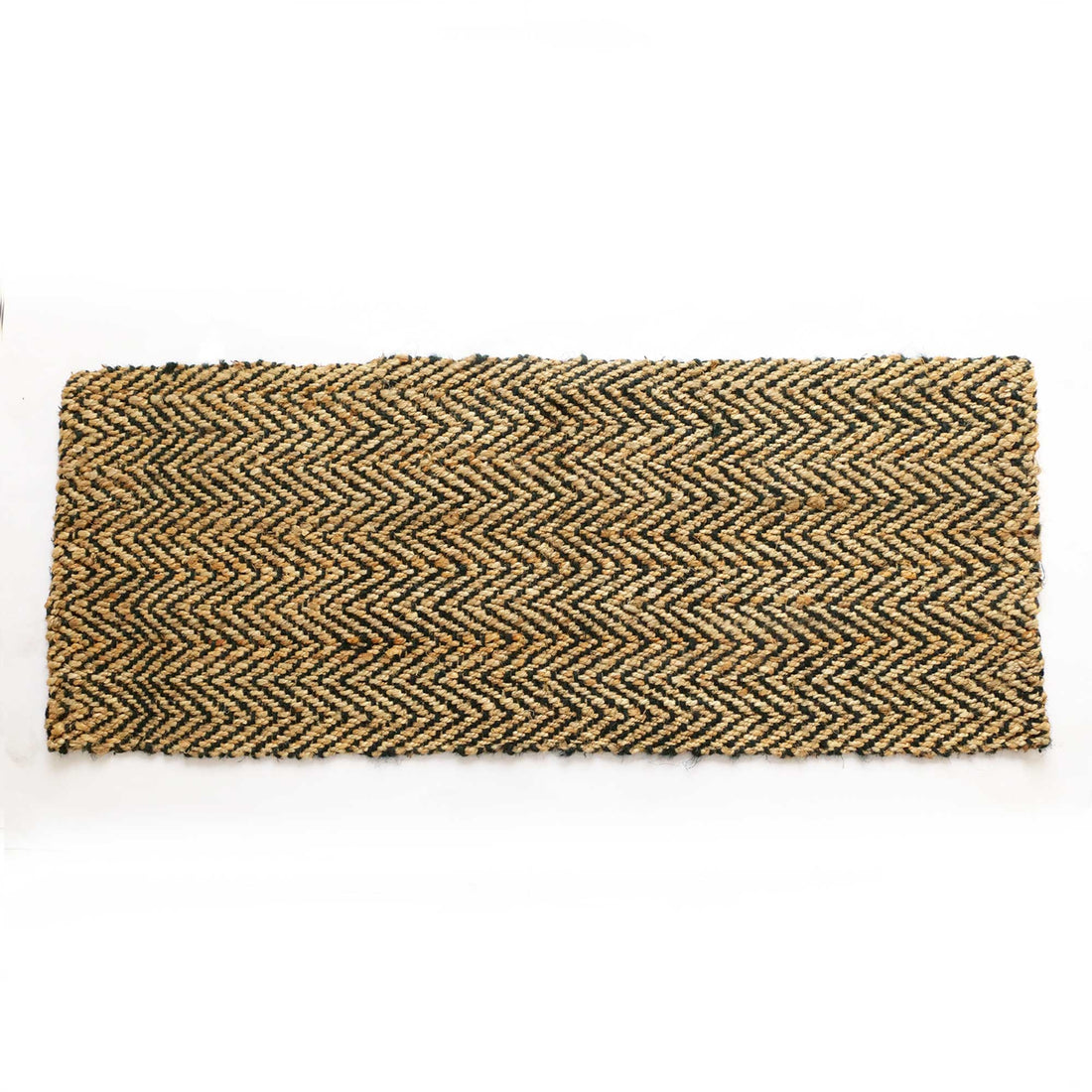 Herringbone patterned doormat on a white background