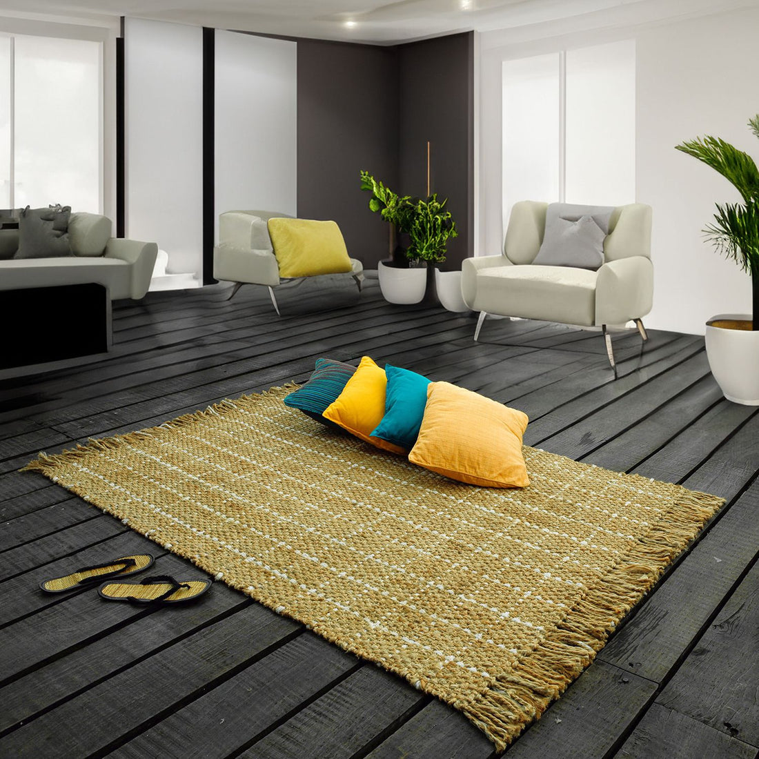 A natural and bleach plaid luxe jute rug with a plush pile, placed on a wooden floor in a modern living room setting, surrounded by furniture and decorative plants.