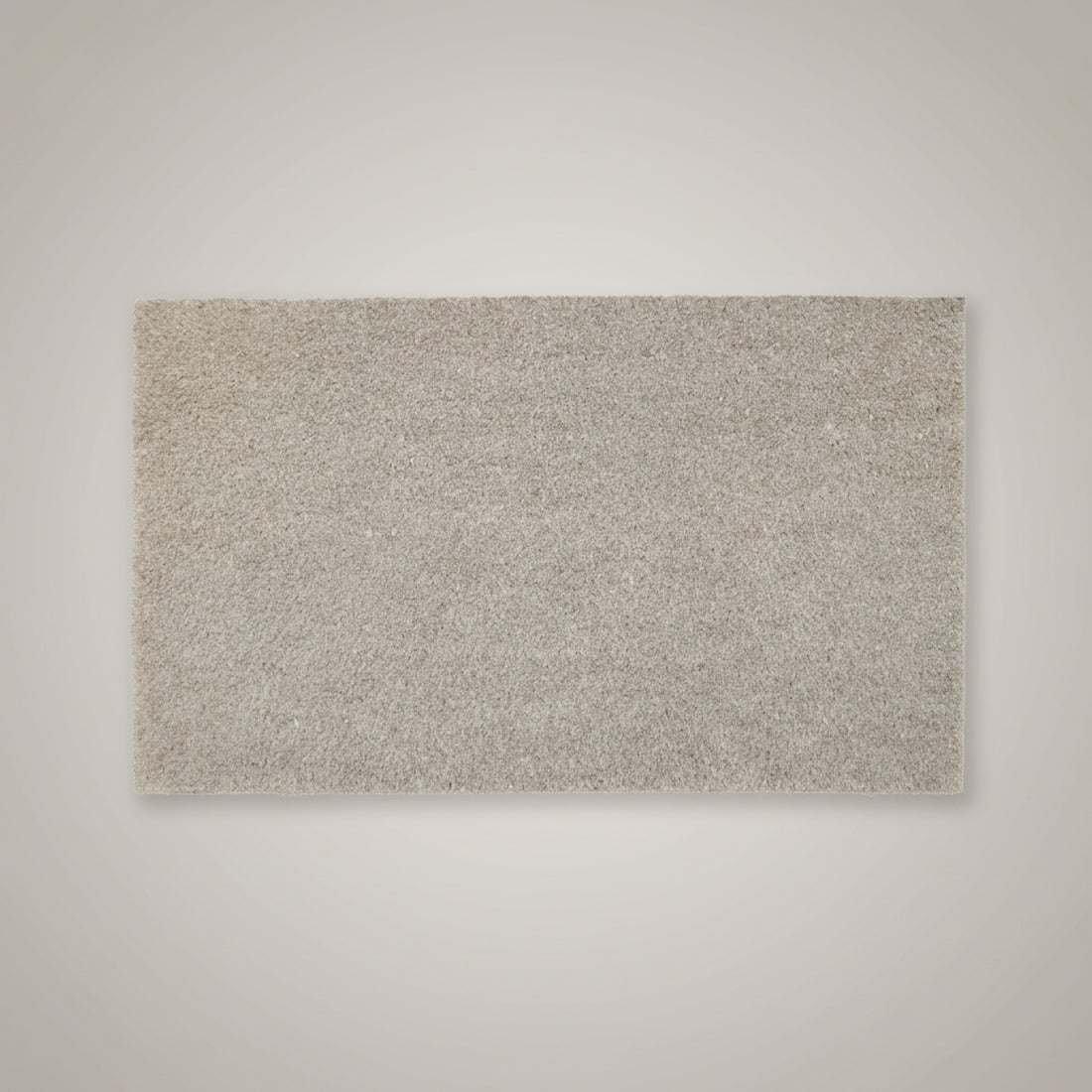
                      
                        A plain grey colour coir entrance door mat with a PVC backing.
                      
                    