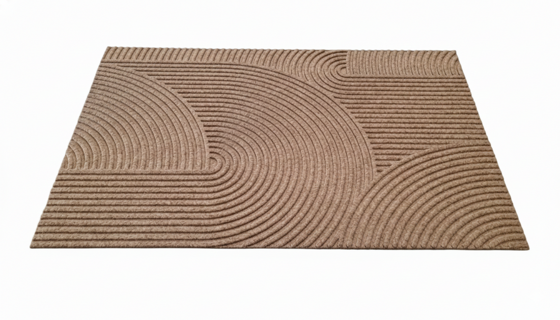 
                      
                        Brown doormat with circular pattern on a white background
                      
                    