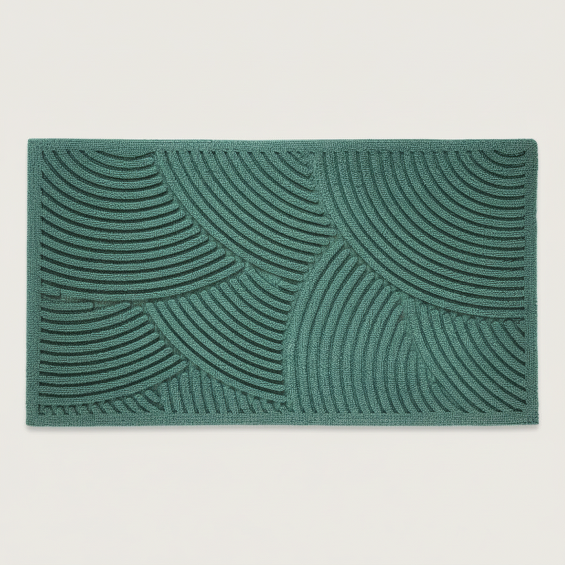 
                      
                        Green doormat with wavy pattern on a white background
                      
                    
