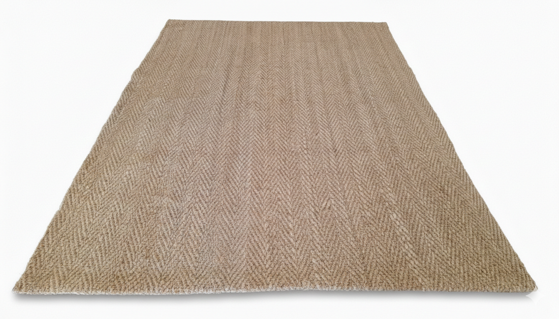 
                      
                        Beige woven rug on a white background
                      
                    