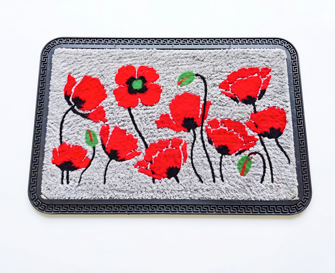 Decorative mat with red floral design on a white background
