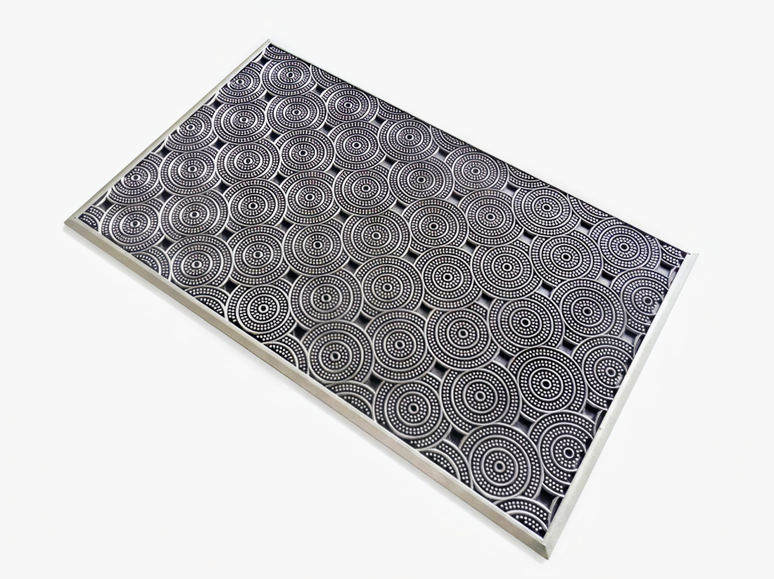 
                      
                        Rectangular mat with black circular pattern on a white background
                      
                    
