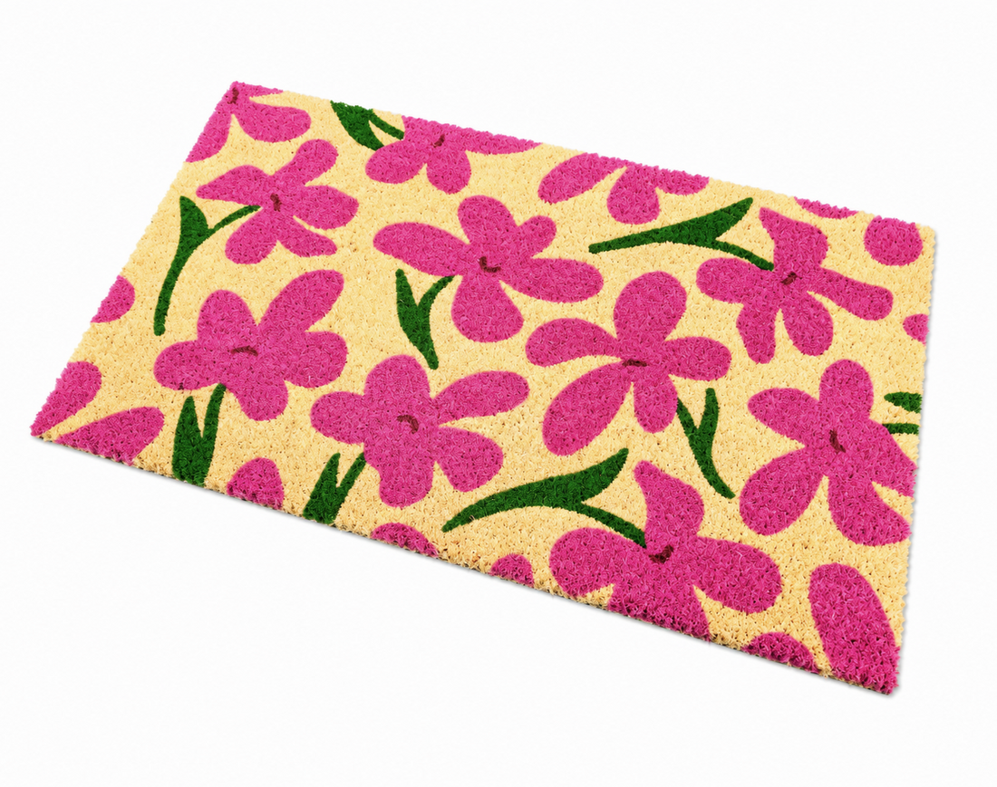 
                      
                        Floral patterned doormat with pink flowers on a beige background
                      
                    