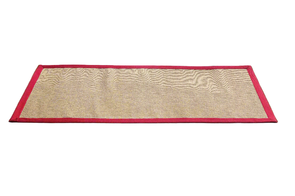 
                      
                        Rectangular jute mat with red border and textured surface on a white background
                      
                    