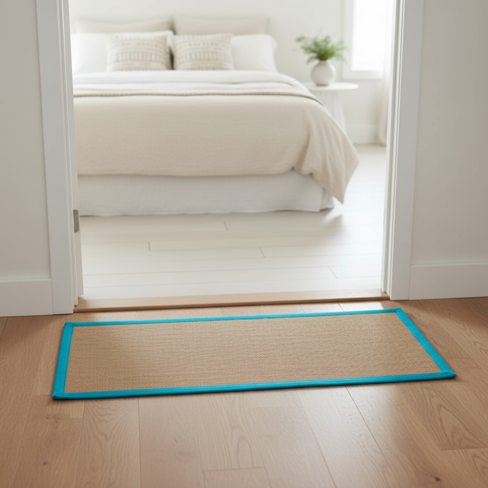 
                      
                        Bedroom with a blue mat on the wooden floor
                      
                    