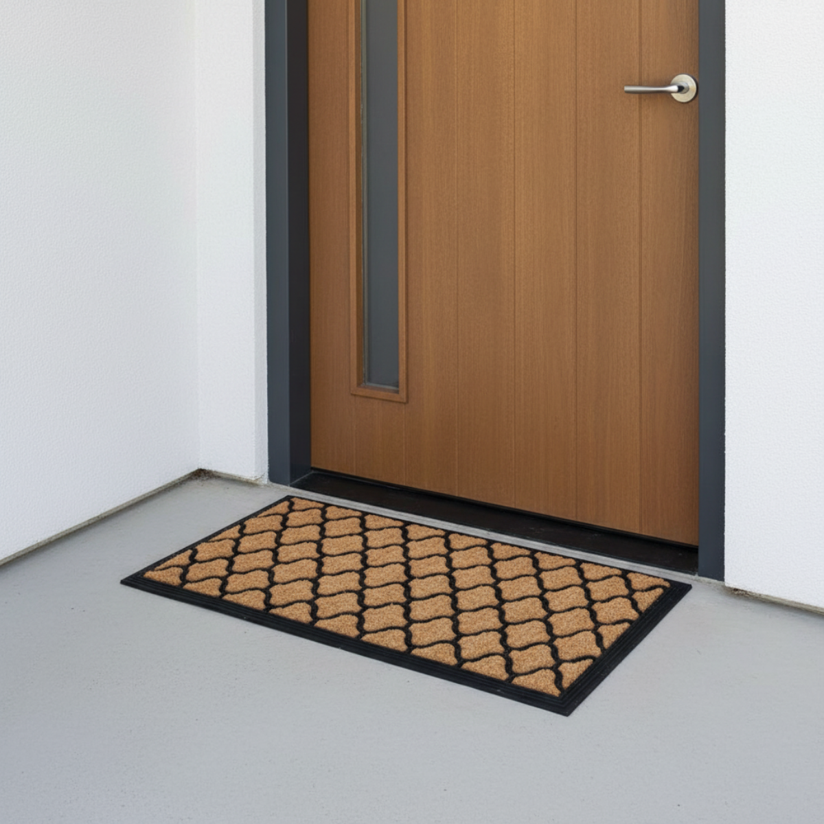 Doormat with geometric pattern in front of a wooden door