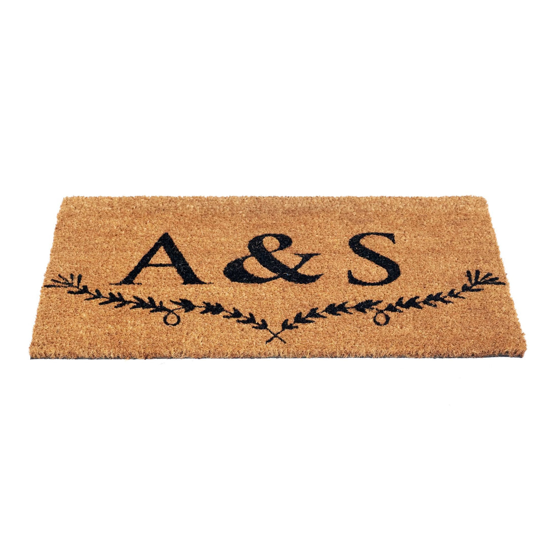 
                      
                        Initials doormat with natural coir fibers and leaf design accent
                      
                    