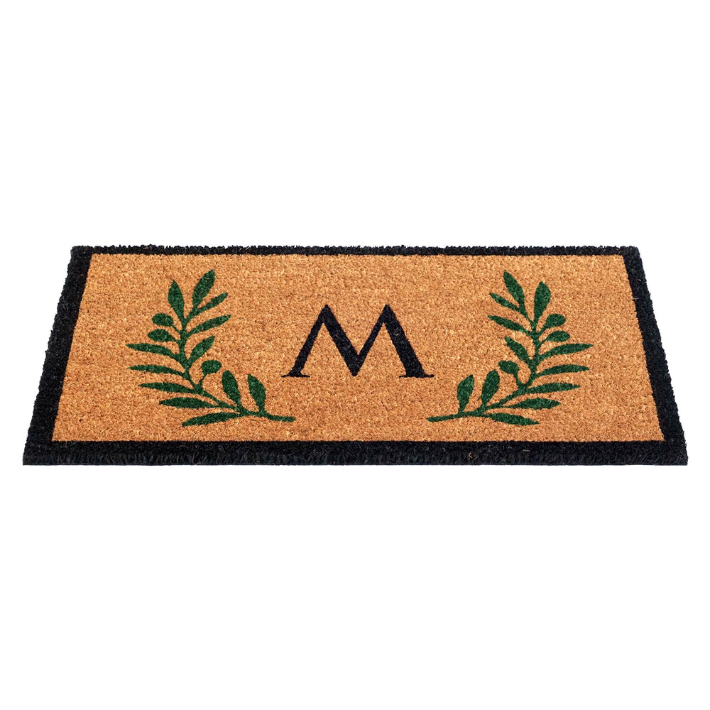 
                      
                        Monogrammed coir mat with nature-inspired border design
                      
                    