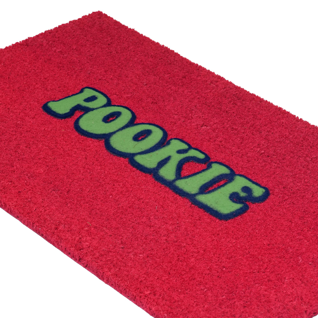 
                      
                        A red textured doormat with the word 'POOKIE' in green letters outlined in dark blue, shown on a white background.
                      
                    