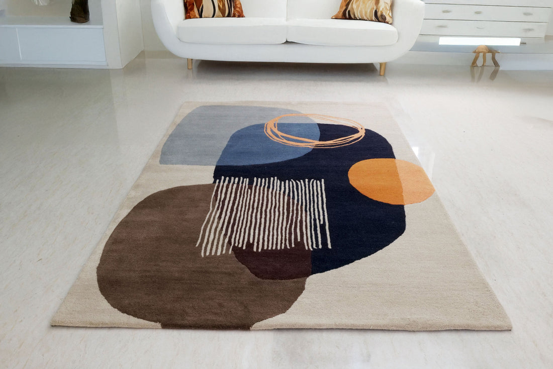 A modern hand-tufted bamboo silk rug with a contemporary geometric design, displayed in a room setting.