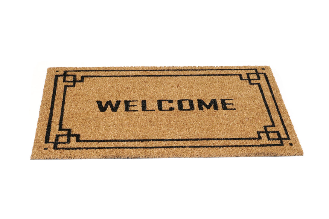 
                      
                        Coir doormat with 'WELCOME' text on a white background
                      
                    