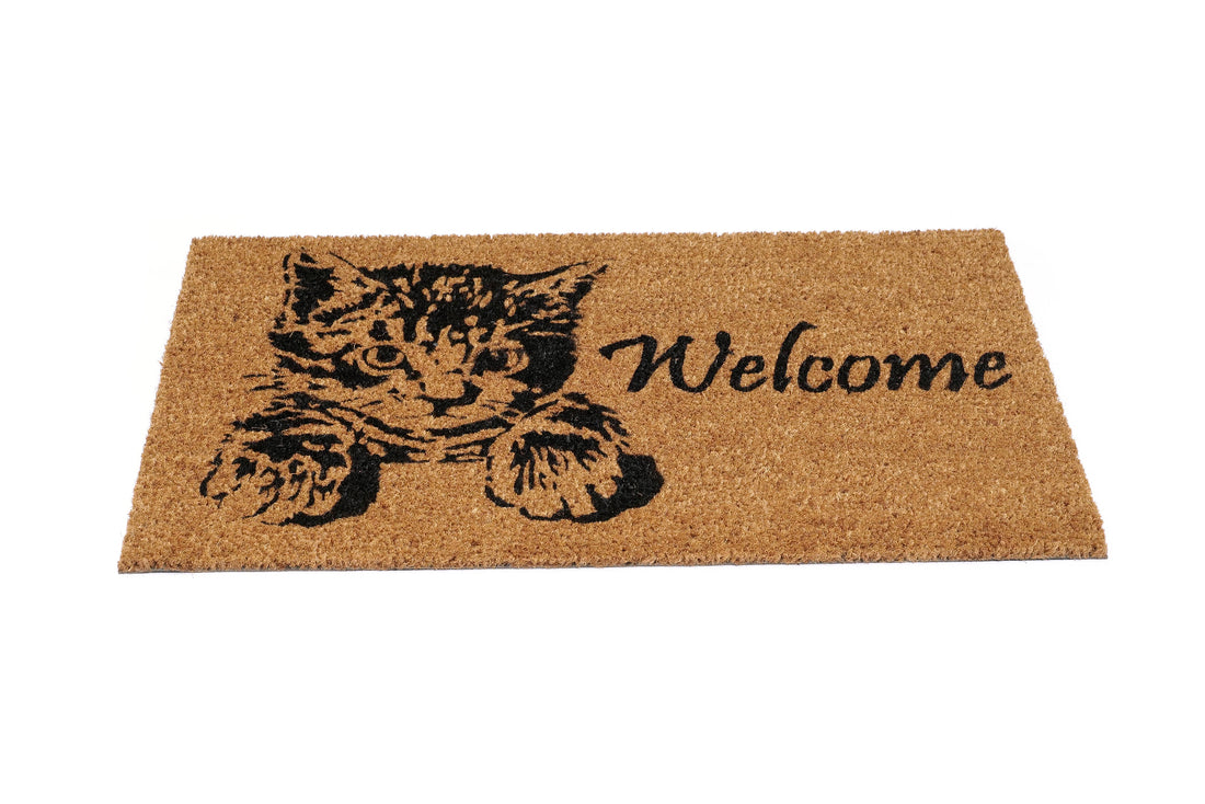 
                      
                        Doormat with a cat design and 'Welcome' text on a white background
                      
                    