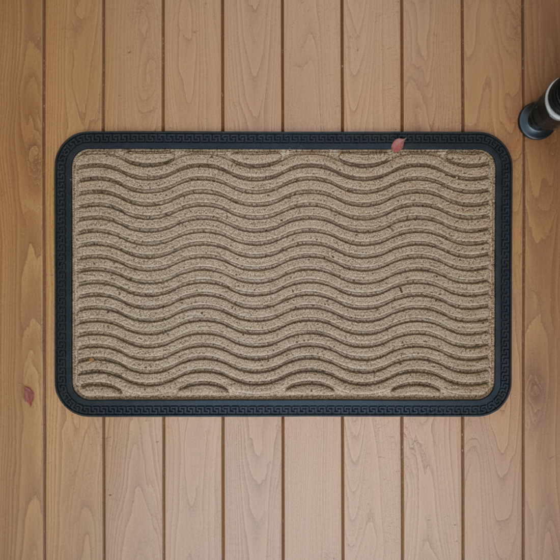 
                      
                        Woven mat with wavy pattern on a wooden floor
                      
                    