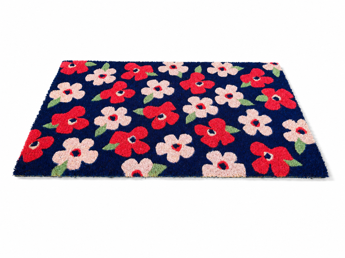 
                      
                        Floral patterned doormat with red, pink, and white flowers on a blue background
                      
                    
