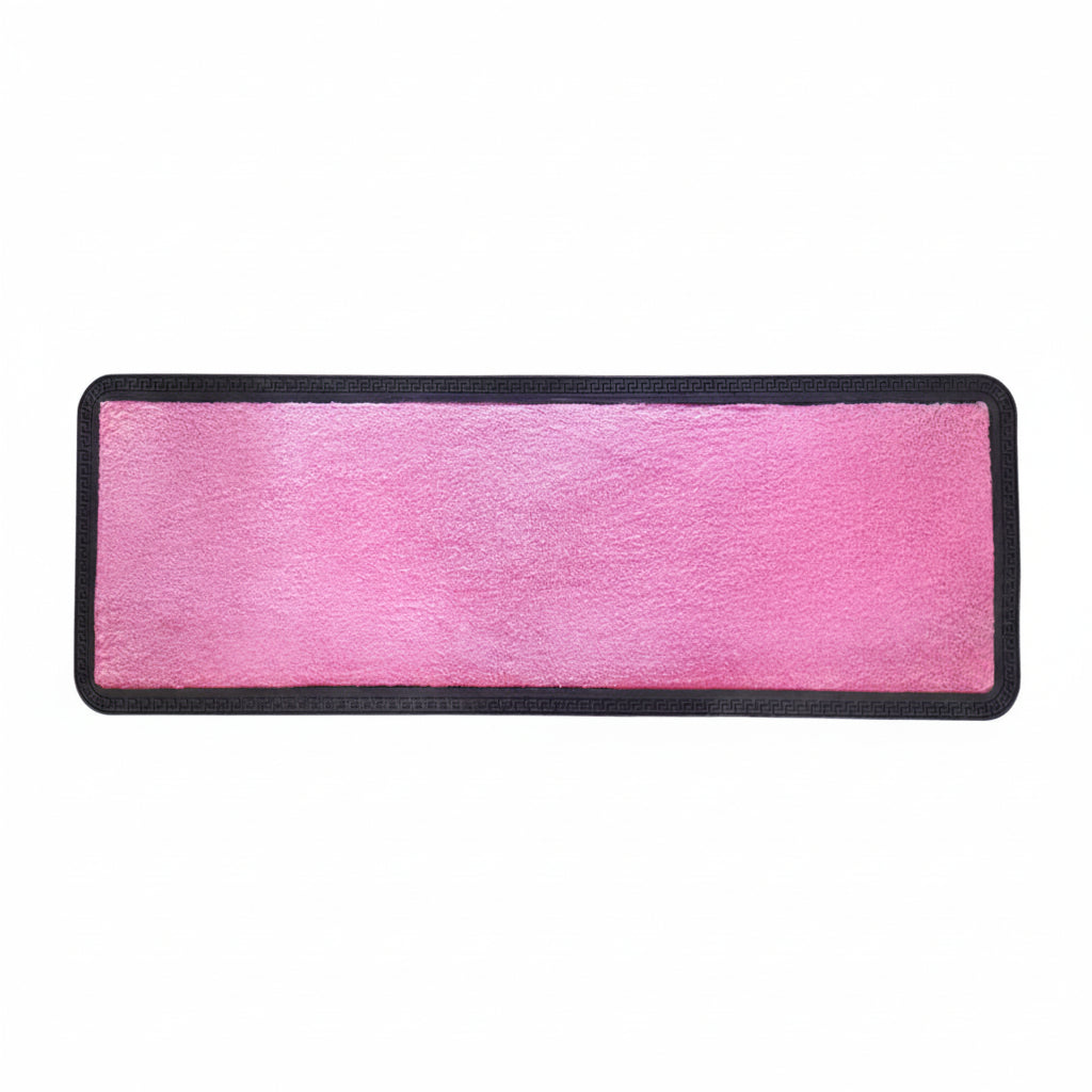 Pink rectangular patch with black border on a white background
