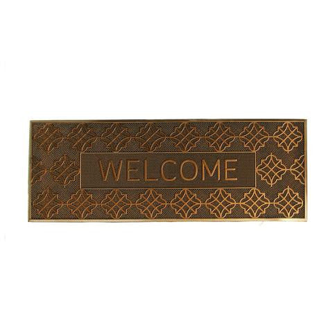A rectangular, golden-colored rubber door mat with a geometric pattern and the word 'WELCOME' embossed in the centre.