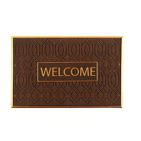 A rectangular, brown rubber pin mat with the word 'WELCOME' embossed in the center, featuring a geometric pattern around the border.