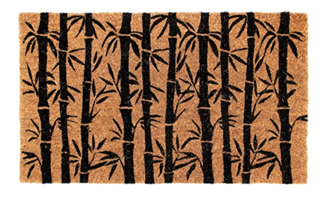 Coir Doormat with black bamboo pattern on a beige background