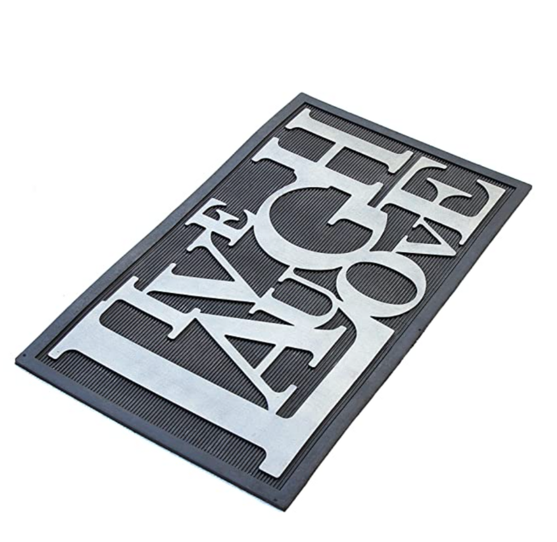 A rectangular metallic finish rubber doormat with the text 'Live Laugh Love' inscribed on it. The mat has a solid gray color with a ribbed texture and is placed on a white background.