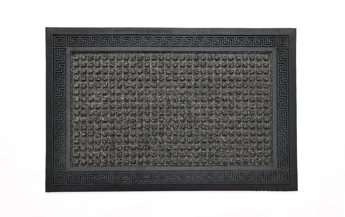 
                      
                        A rectangular grey entrance mat with an anti-slip design and a visible branded pattern on the border.
                      
                    