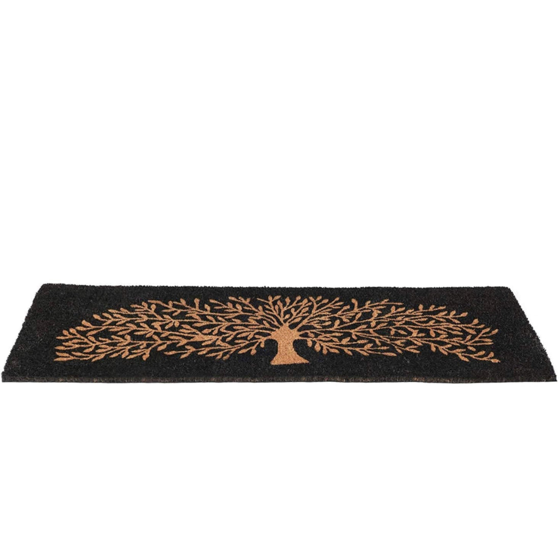 
                      
                        Black coir doormat with tree design on a white background
                      
                    