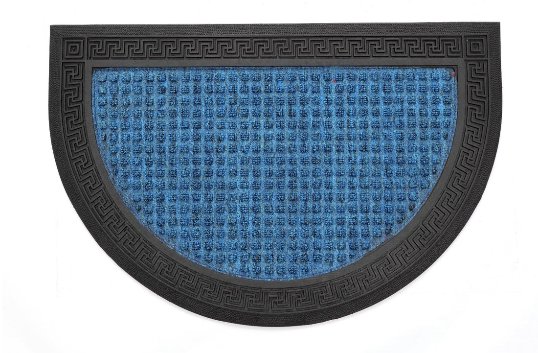
                      
                        A blue rectangular doormat with an anti-slip design and black trim, featuring a geometric pattern.
                      
                    